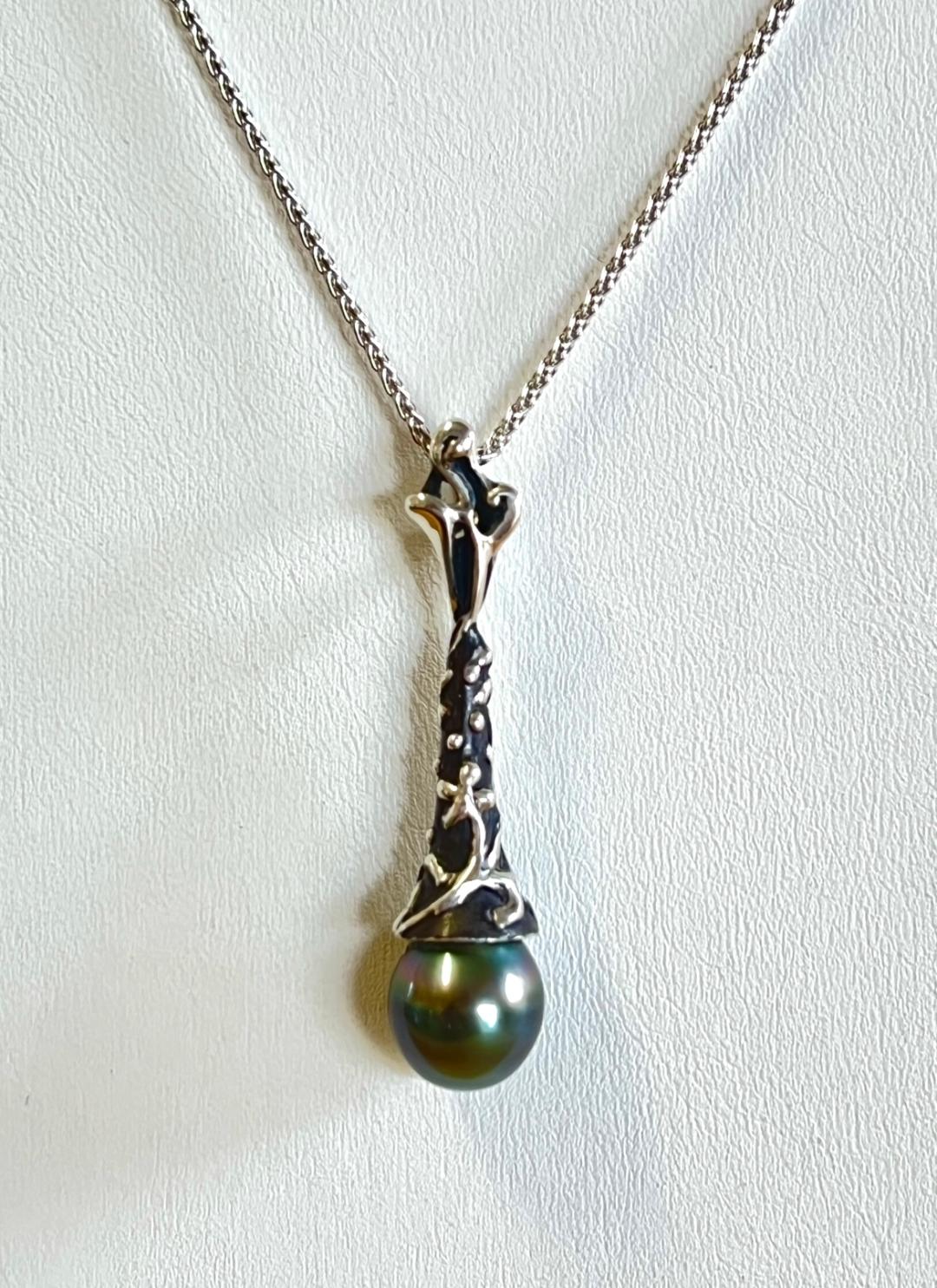 Floral Trumpet with a Tahitian Pearl